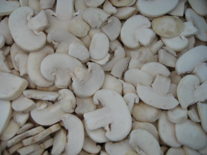 Грибы шампиньоны резаные замороженные