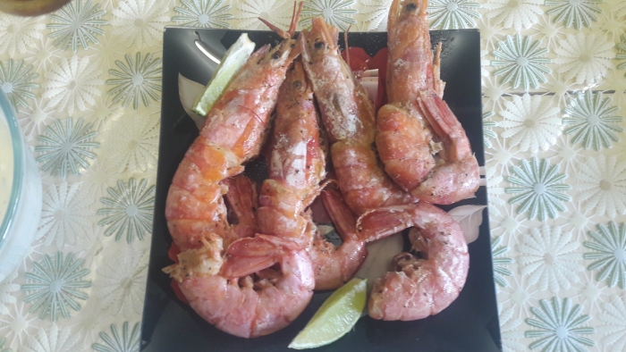 Жареные лангустины на сковороде