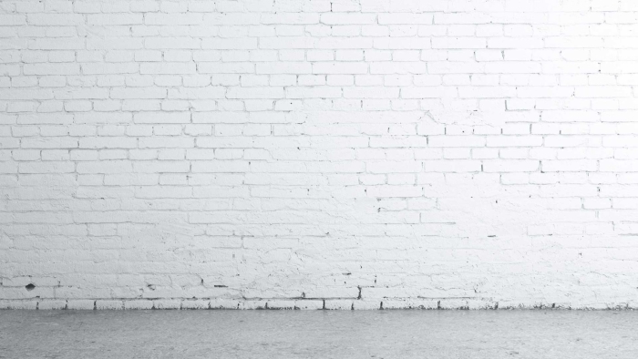 Белая кирпичная стена фон